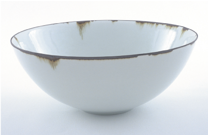 Bowl, 2005, porcelain with porcelain glaze, banded iron rim, reduction fired, h.10cm, d.26cm. Photo: Jim DeGregorio